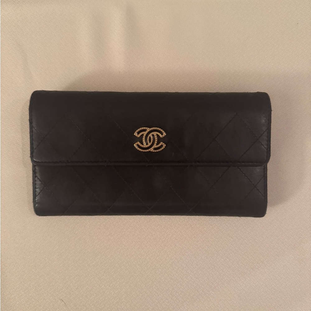 CHANEL Black Quilted Wallet with Gold Logo